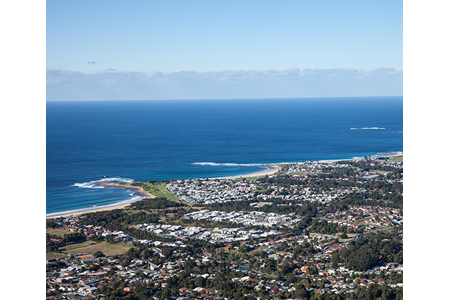 Aerial view over coastal city
