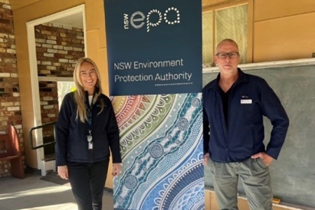 Two EPA officers at the community drop-in stand