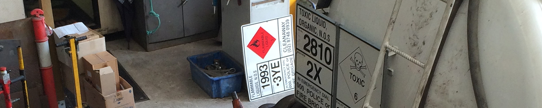 Tank vehicle displaying placard for toxic substances - in a Dangerous Goods tank vehicle workshop