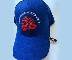 blue cap with red waratah and text NSW bushfires 2019-2020