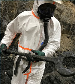 worker in protective clothing