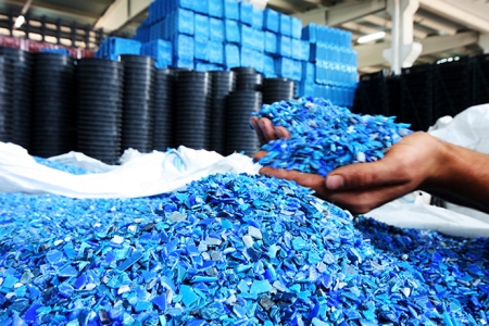 blue plastic tags recycled at waste facility