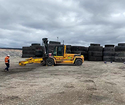 piles of truck tyres illegally stored at mine