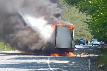 truck carrying dangerous goods on fire