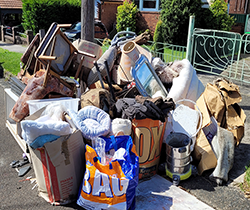 rubbish dumped on kerbside