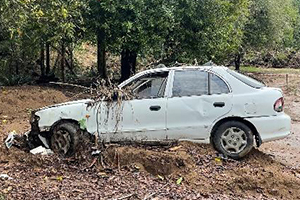 Flood debris - ruined car