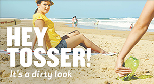 Hey Tosser! Woman giving a dirty look to person littering on a beach