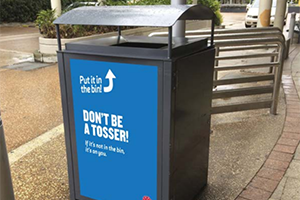 Don't be a tosser! sign on rubbish bin