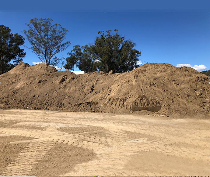 Large mounds of reclaimed construction soil